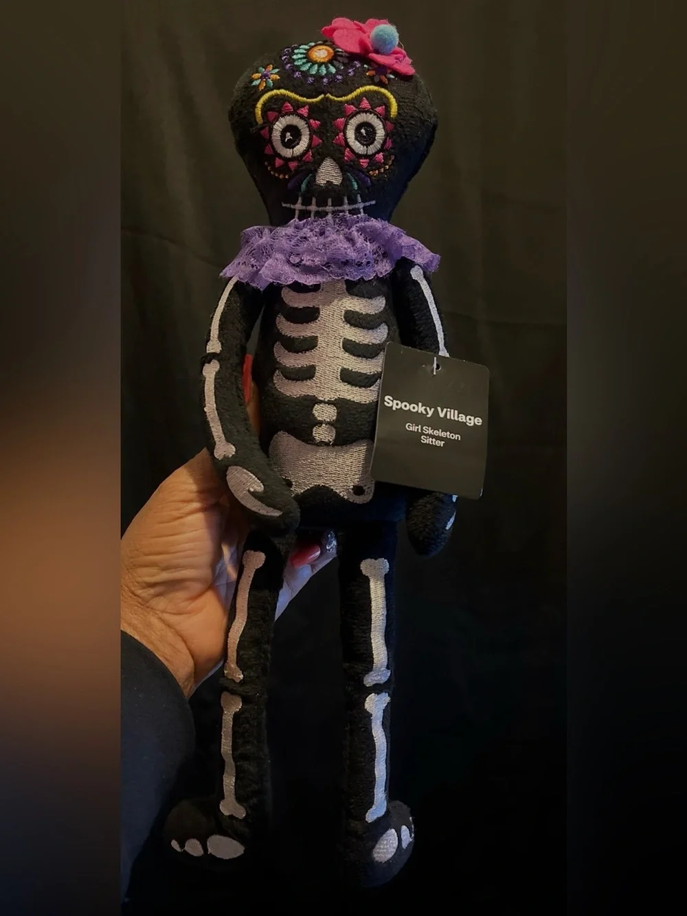 Festive Black Skeleton Plush Sitter with Purple Lace Collar - Brand